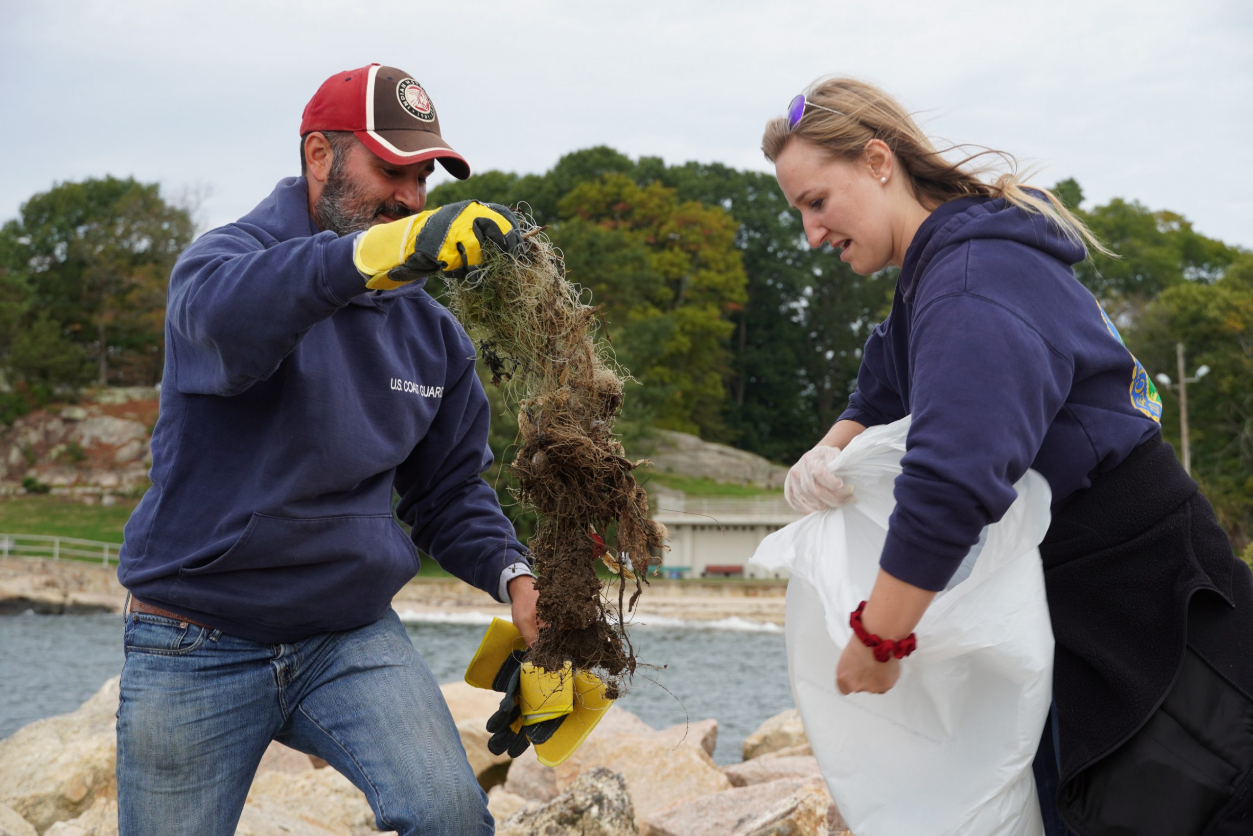 Volunteers collect fishing line during coastal cleanup